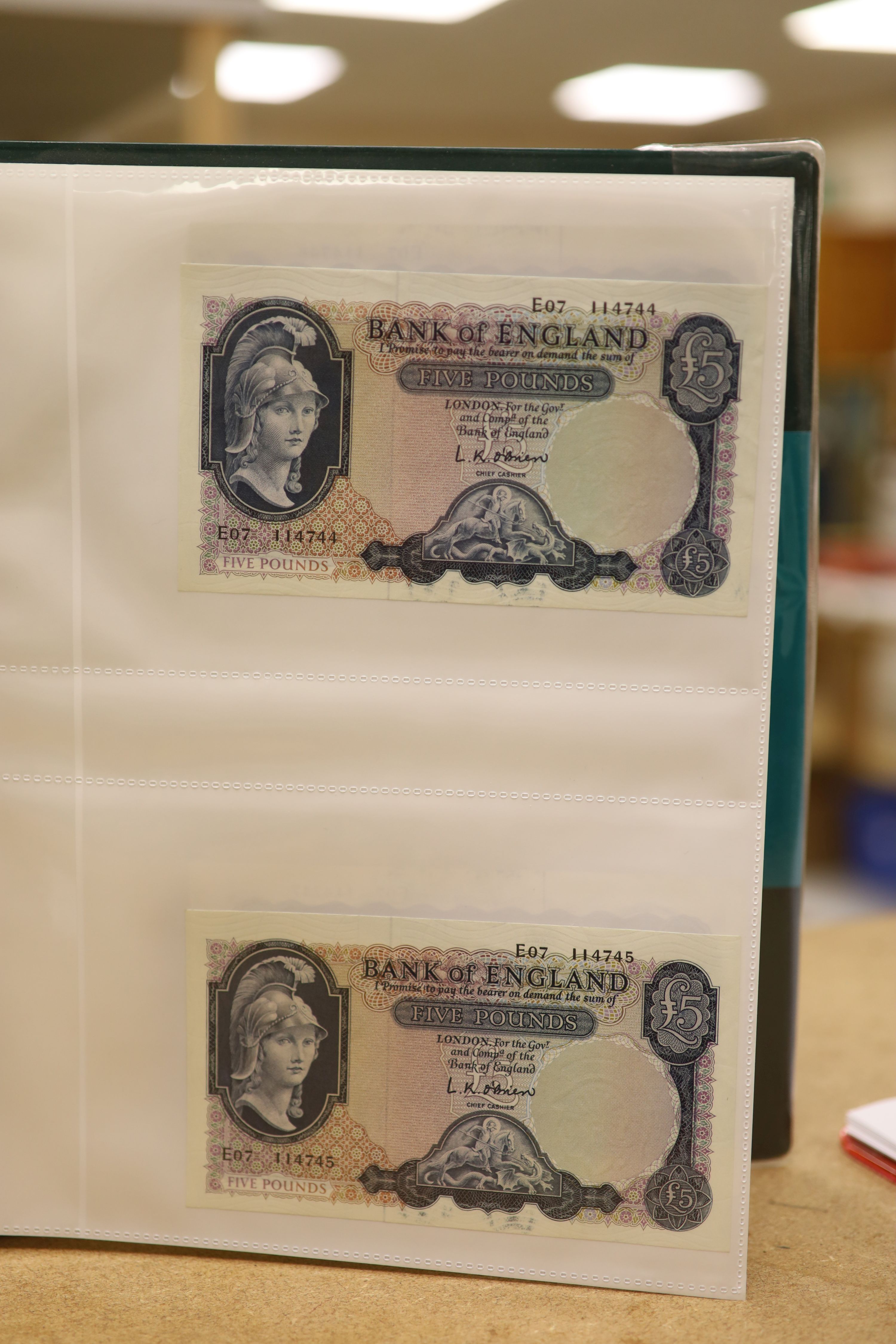 A collection of Bank of England and Scottish banknotes to include: 21 QEII 10 shillings, 14 O'Brien and Beale 10 shillings, 1 Peppiatt 10 shillings, 4 Hallam one pound notes, 18 O'Brien or Beale one pound notes, 8 Peppia